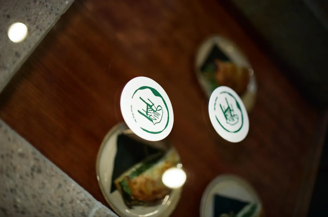 Abrazo coasters on the bar