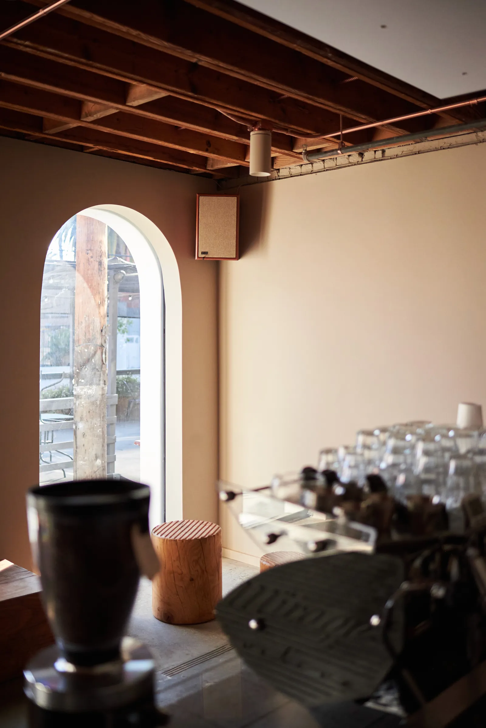 The espresso machine by the arched window at 821 Traction Ave