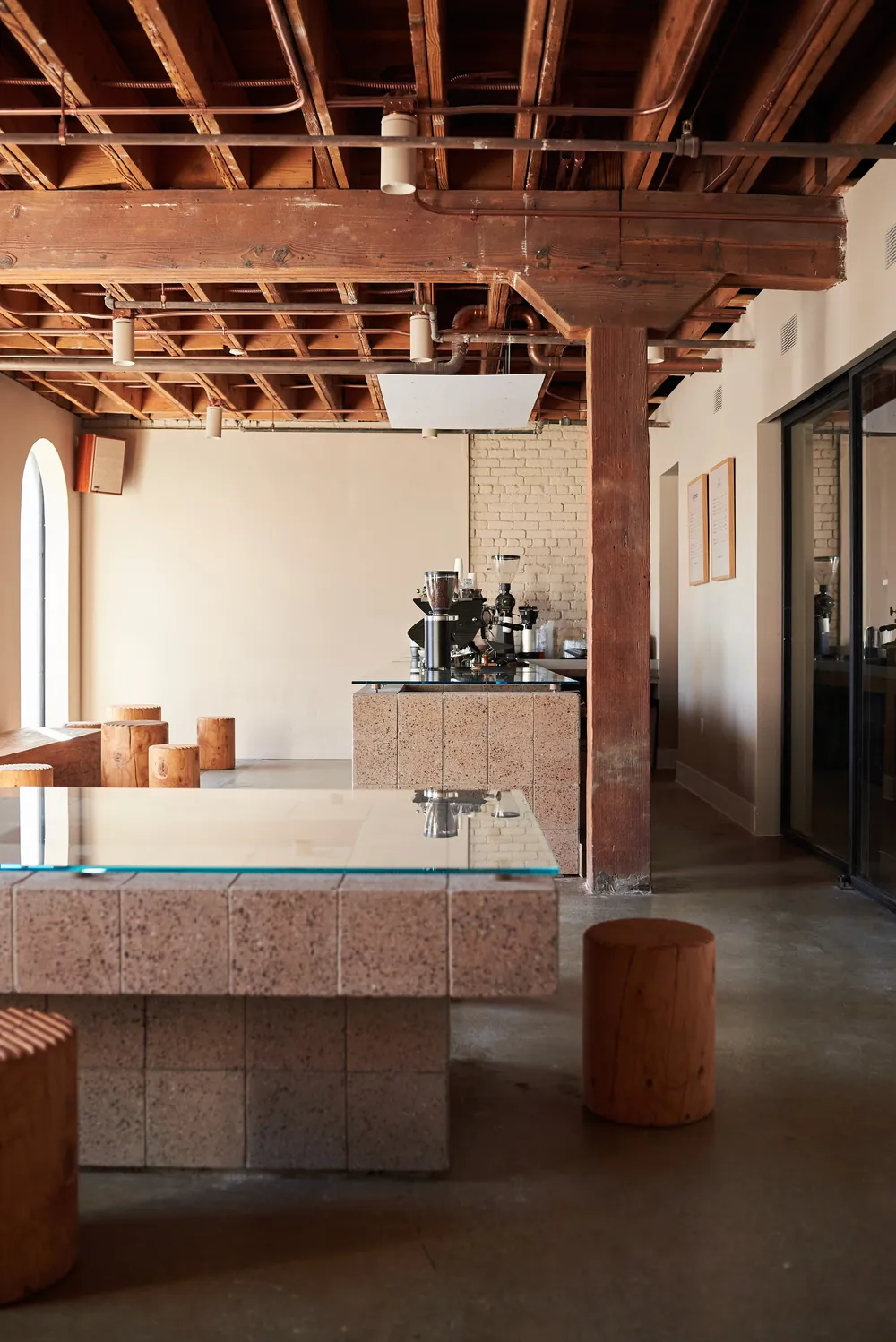 The terrazzo bar and timber stools in the Arts District